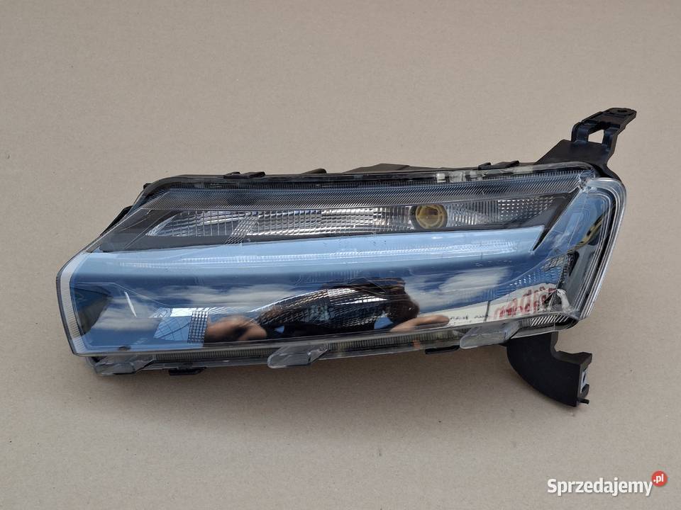 DACIA SPRING LAMPA LEWA DRL KIERUNKOWSKAZ