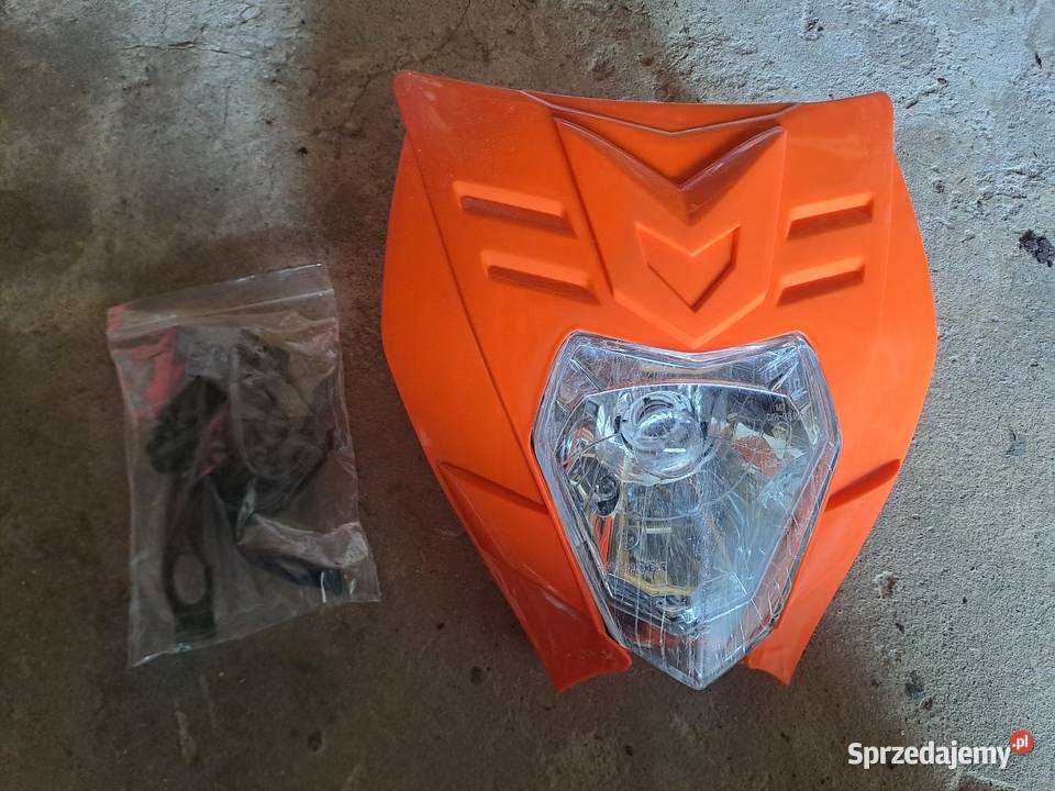 Reflektor motocyklowy z owiewką Drzewce