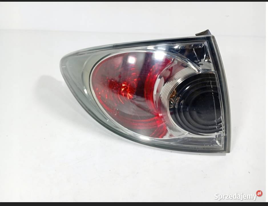 Mazda 6 0208 Lampa tyl z błotnika OE2206198L Brzeg