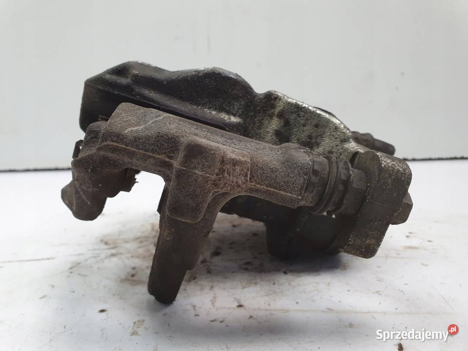 Toyota Corolla XII E21 TYLNY ZACISK HAMULCOWY Janów