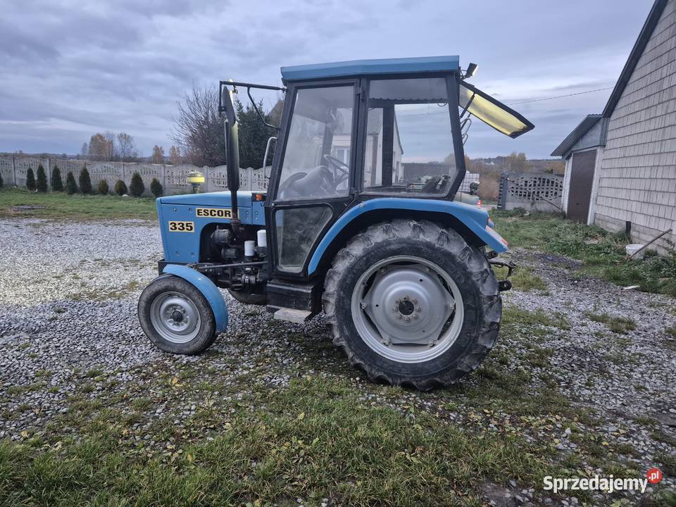 Sprzedam ciągnik rorniczy escort c335 Zaczep dolny