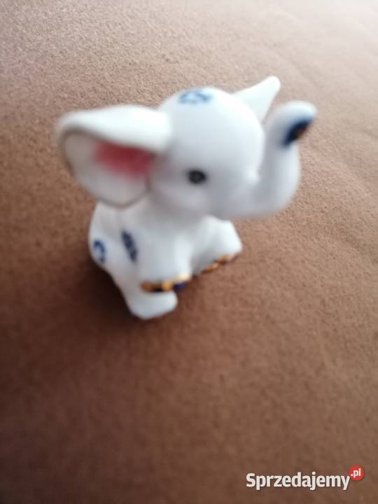 Porcelanowy słonik z złotymi zdobieniamiFigurka Łódź