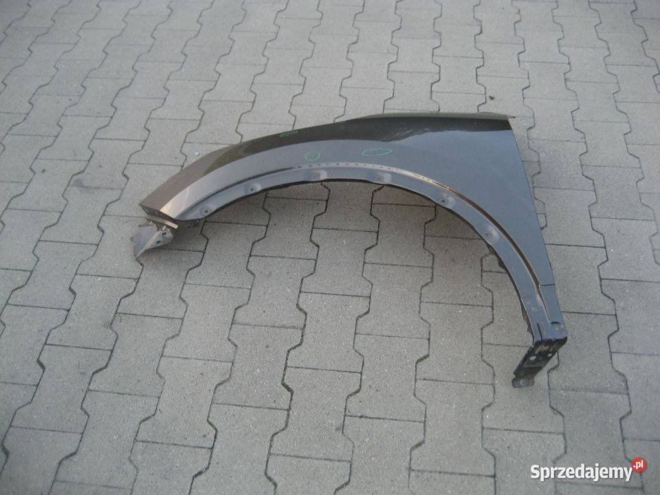 NISSAN QASHQAI II J11 1417R BŁOTNIK PRZÓD LEWY Błotniki Rakoniewice