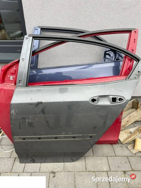Honda City II drzwi lewy tył 08 części blacharskie Kozubszczyzna