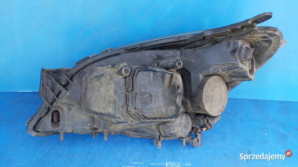 LAMPA PRAWY PRZÓD EUROPA XENON OPEL ASTRA H III wielkopolskie Nowy Tomyśl