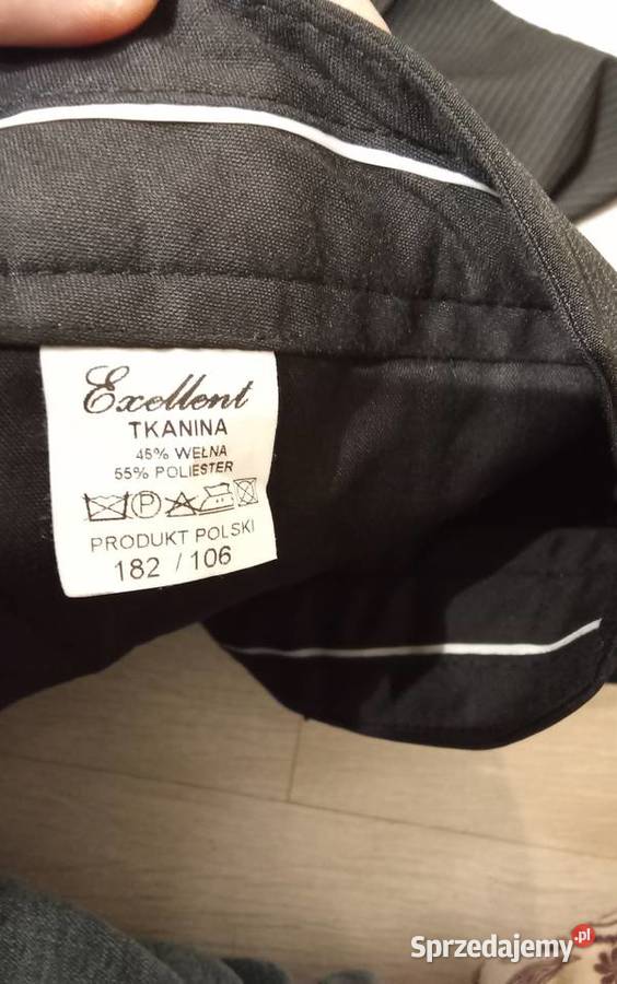 Sprzedam Garnitur Czarny Z Niebieską Nitka Rozmiar Większe niż 62 Golub-Dobrzyń