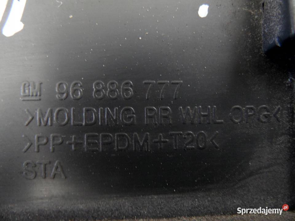 ORLANDO I 11r listwa błotnika lewy tył 96886777