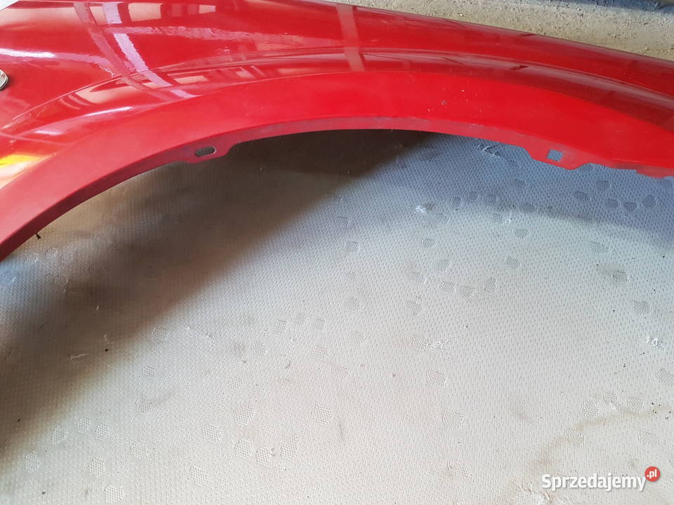 DACIA LOGAN I MCV BLOTNIK PRAWY PRZOD CZERWONY Turek