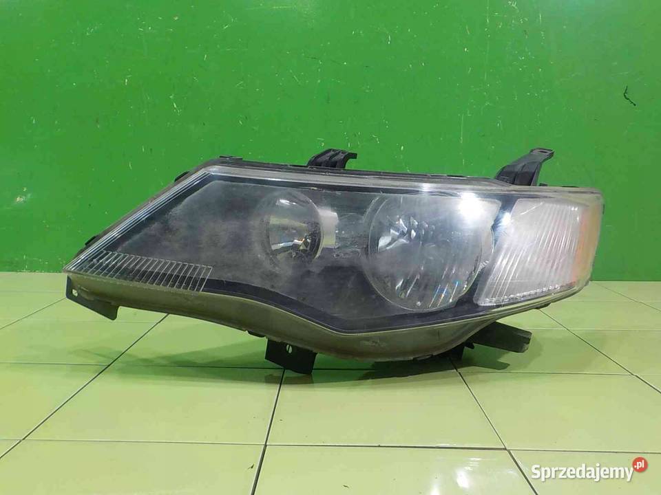 MITSUBISHI OUTLANDER II 20 DID 09r lampa lewa Lampy przednie Suków