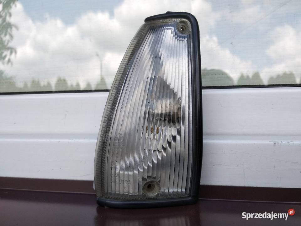 Nissan Micra K10 lampa pozycyjna postojowa lewa Lampy przednie Sieradz