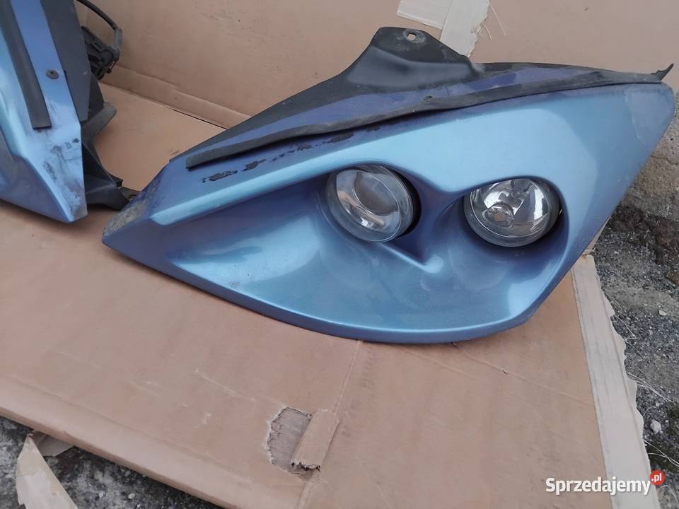 Lampy przód Ford Focus MK1 Hella Morette osobowe Lampy przednie Grodków
