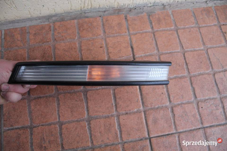 KIERUNKOWSKAZ ZDERZAKA LEWY LC9X VW PASSAT B6