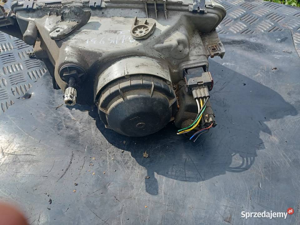 Lampa reflektor przedni lewy Saab 93 9802r osobowe