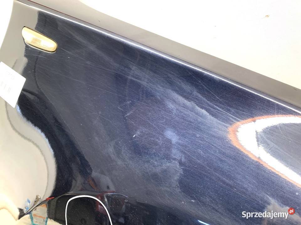 BŁOTNIK PRAWY PRZÓD BMW E87 Hatchback 0313