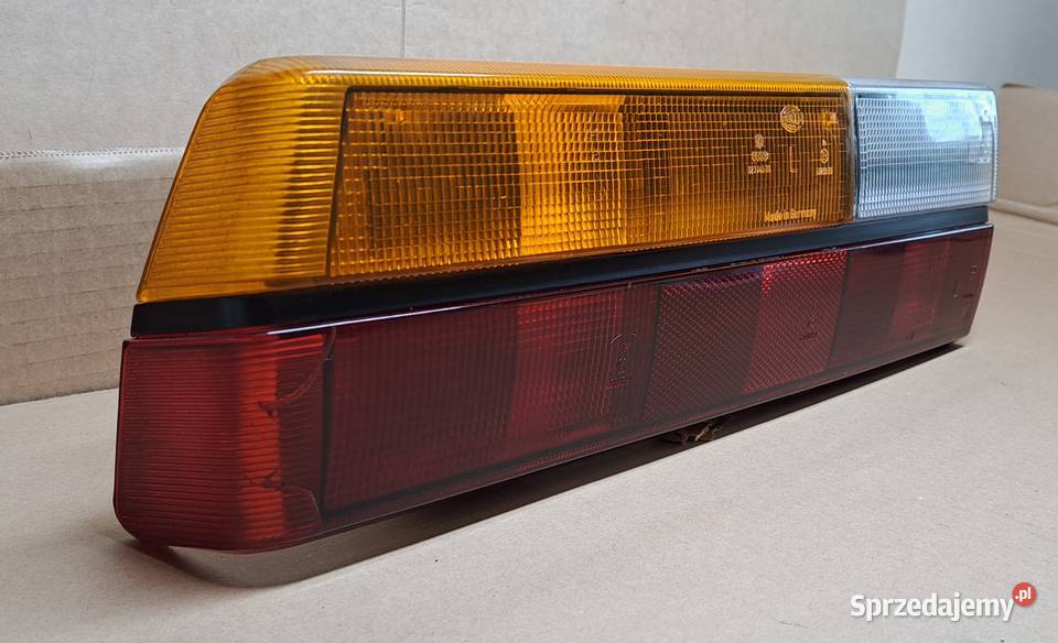 LAMPA TYŁ TYLNA LEWA AUDI 80 B1 SEDAN 823945285 osobowe Mielęcin