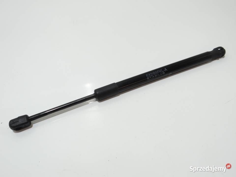 SIŁOWNIK MASKI BMW E88 7225518 Strzyżewice