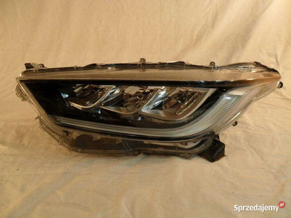 Reflektor Przód strona lewa Toyota Yaris MM194 osobowe Motoryzacja Nowy Tomyśl