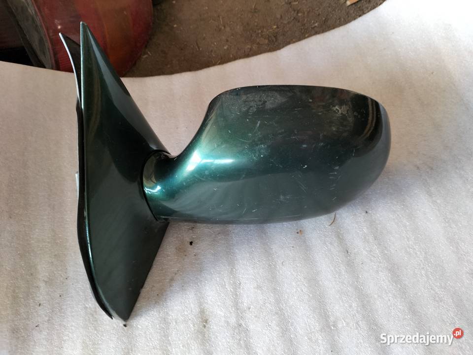 LUSTERKO LEWE Kia Carnival I 1 012107