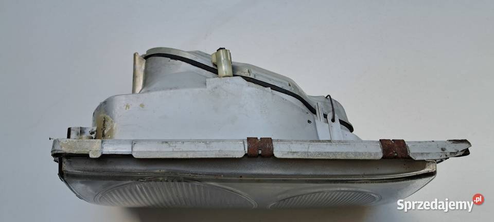 Reflektor prawy Hella Mercedes W123 pomorskie Luzino