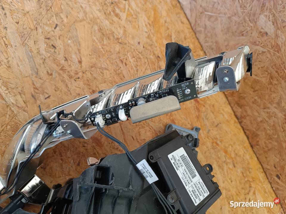 SOCZEWKA LAMPY PRAWY PRZÓD 28323AB 68280815AA osobowe Nowy Tomyśl