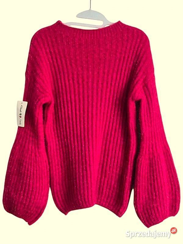 Wiralowy sweter w kolorze fuksji rękaw dzwonek