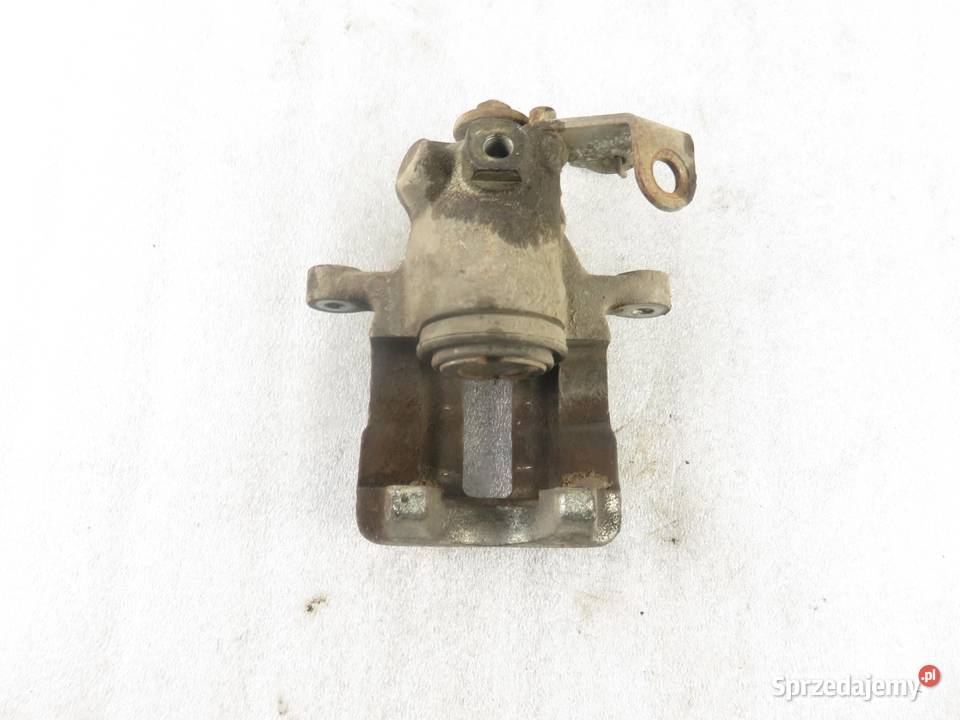 ZACISK LEWY TYŁ AUDI A6 C4 25 TDI