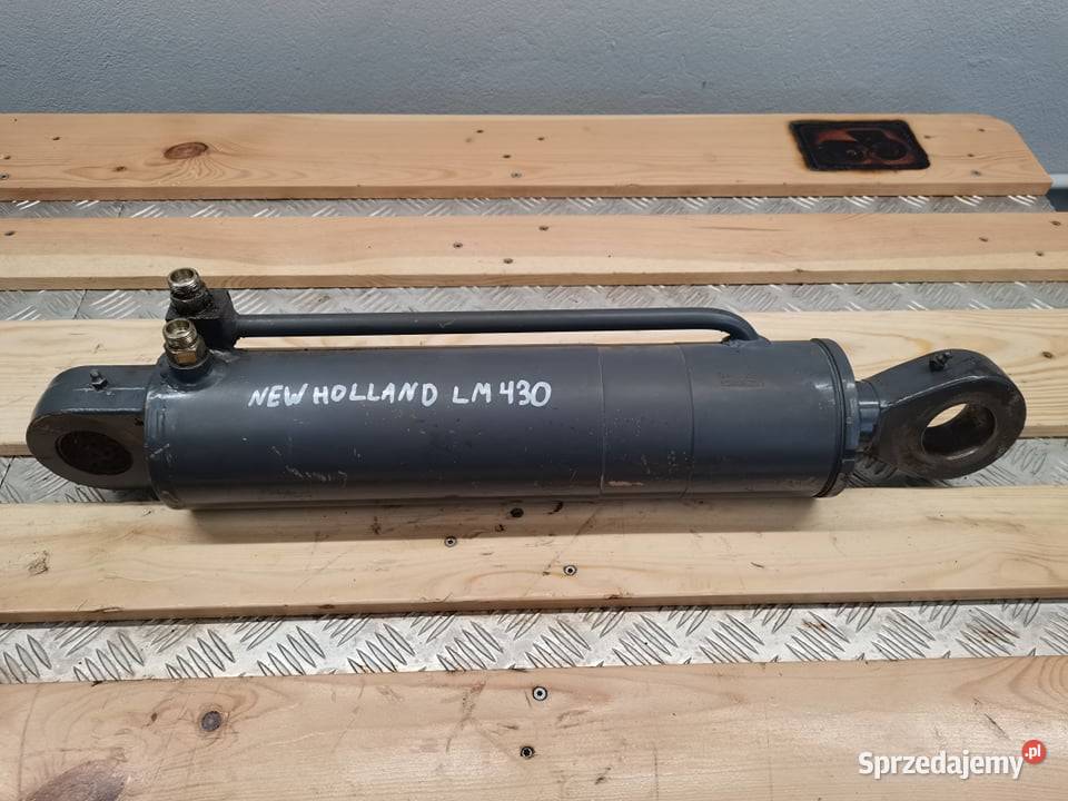 Holland LM 430 Siłownik poziomowania