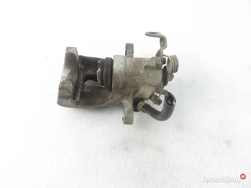 ZACISK LEWY TYŁ OPEL MERIVA A 16 16V 105 Z 16