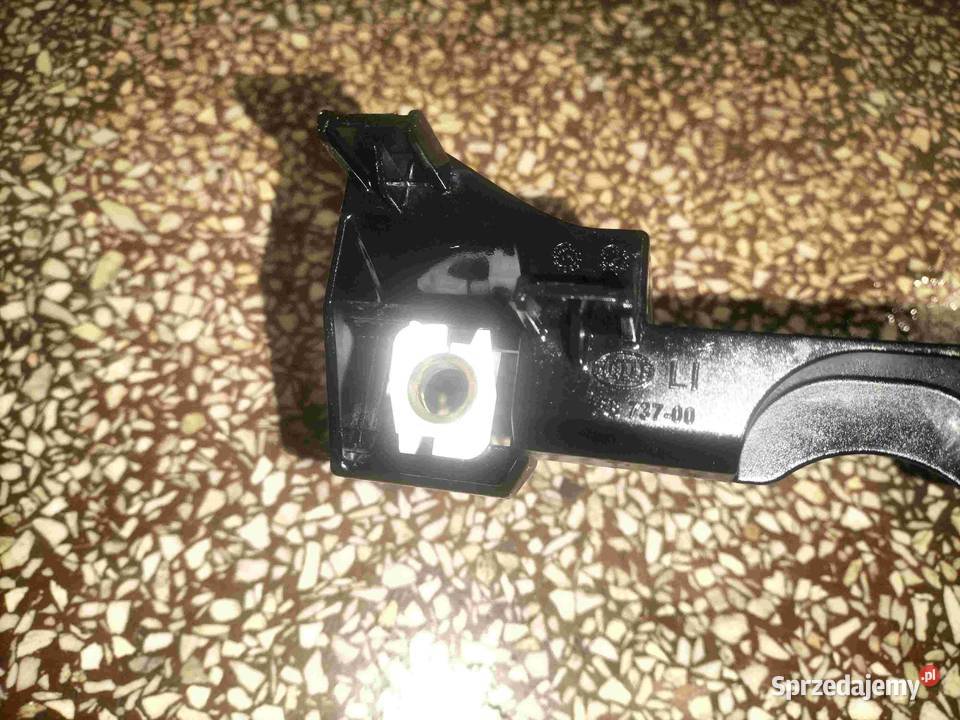 Ślizg reflektora przedniego LEWY BMW E60 E61 PRE Motoryzacja