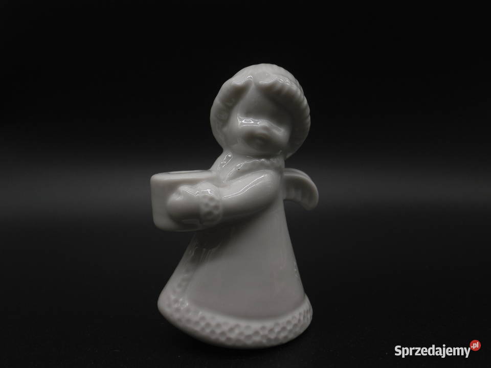 Porcelanowa figurkaświecznik aniołek Porcelana i szkło Raszków