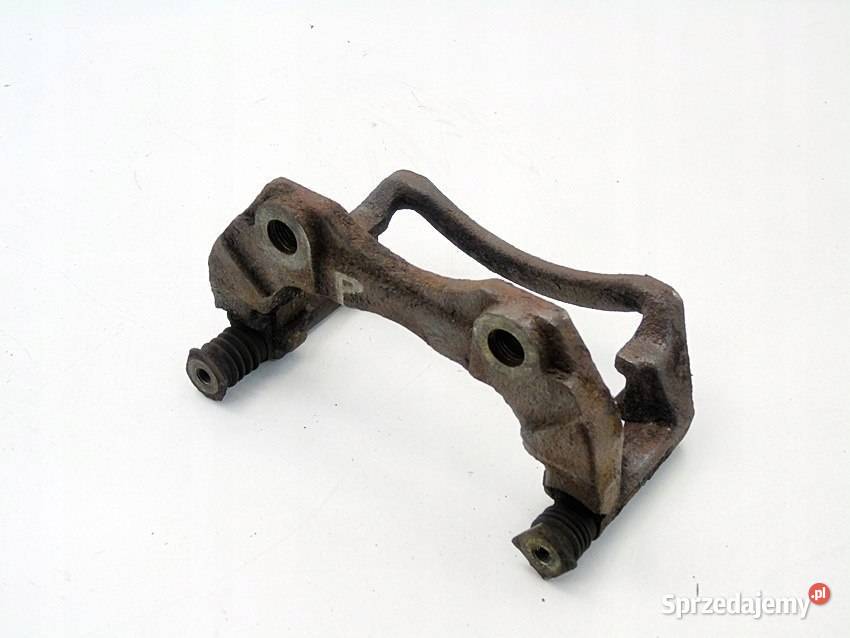 Jarzmo zacisku hamulcowego prawy przód Nissan śląskie Sosnowiec