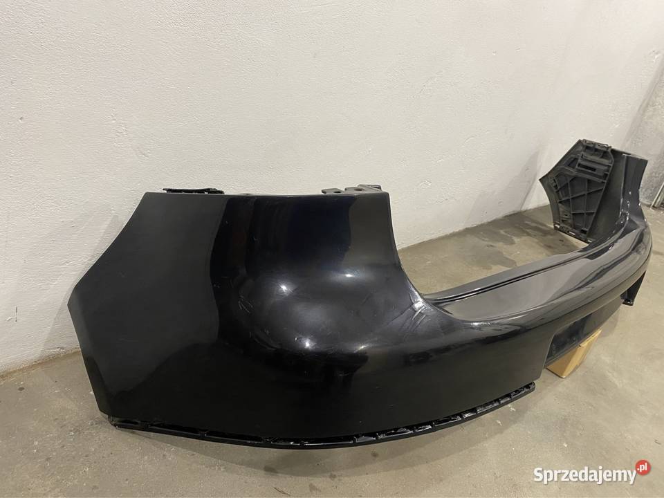 Vw golf V 5 zderzak tyl ze slizgami czarny Pełkinie