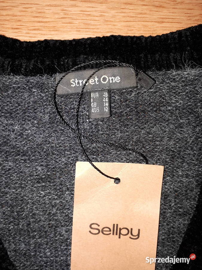 Sprzedam nowy sweter narzutkę 40 Bez wzoru