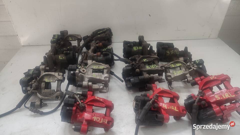 ZACISK HAMULCOWY PRAWY LEWY TYŁ AUDI 5Q0615406B Włoszczowa