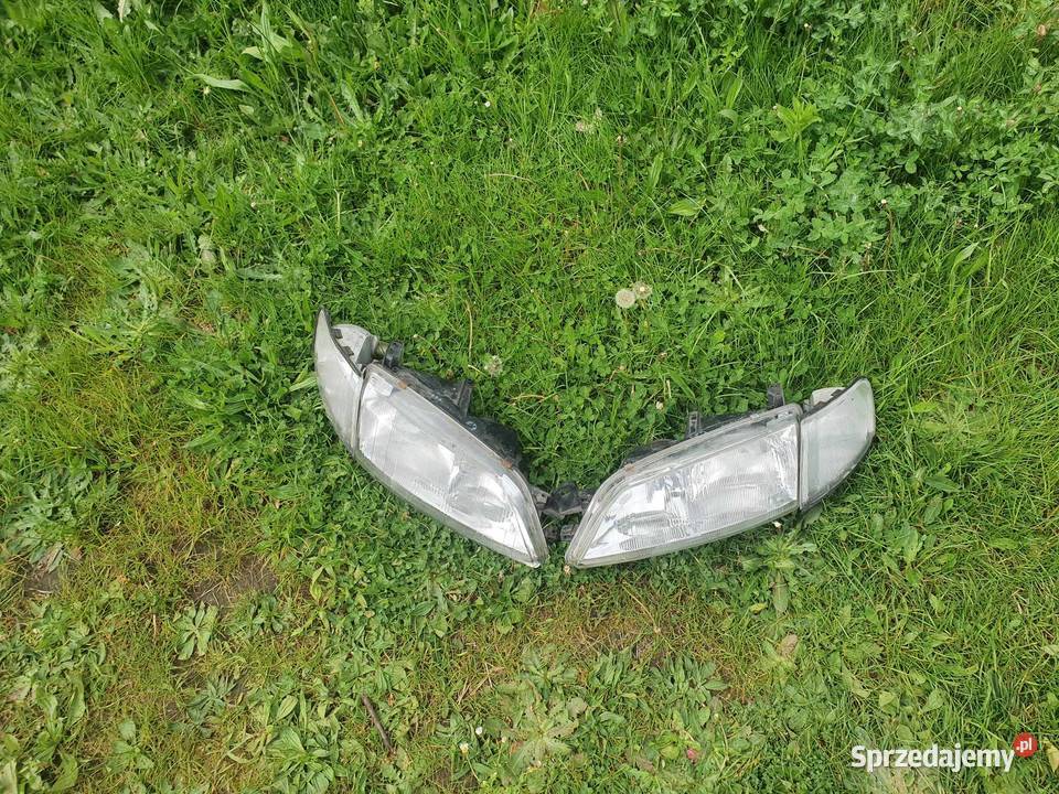 Lampa przednia prawa lewa Opel Vectra B 9699
