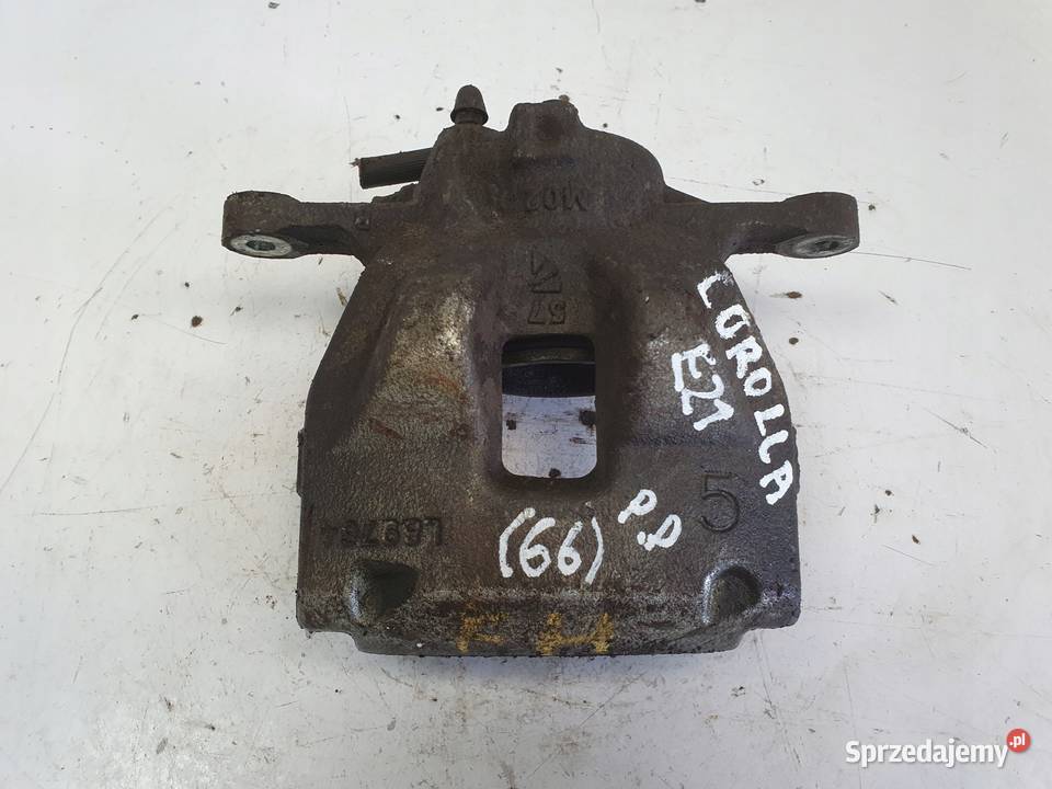 Toyota Corolla XII E21 PRAWY PRZEDNI ZACISK Rudka