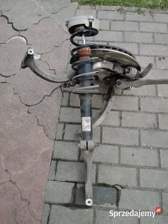 Kolumna amortyzator zwrotnica tarcza zacisk Audi