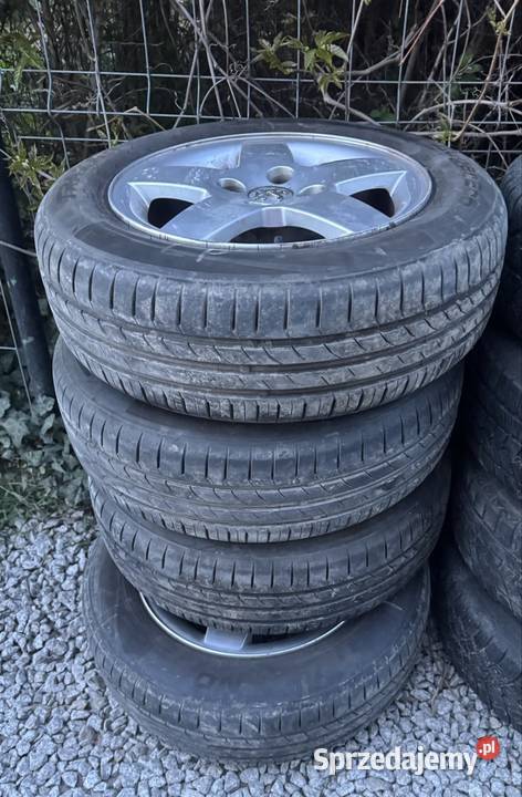Felgi Peugeot 4x108 opony 1856515 2023r 206 207 Peugeot OE Krępiec