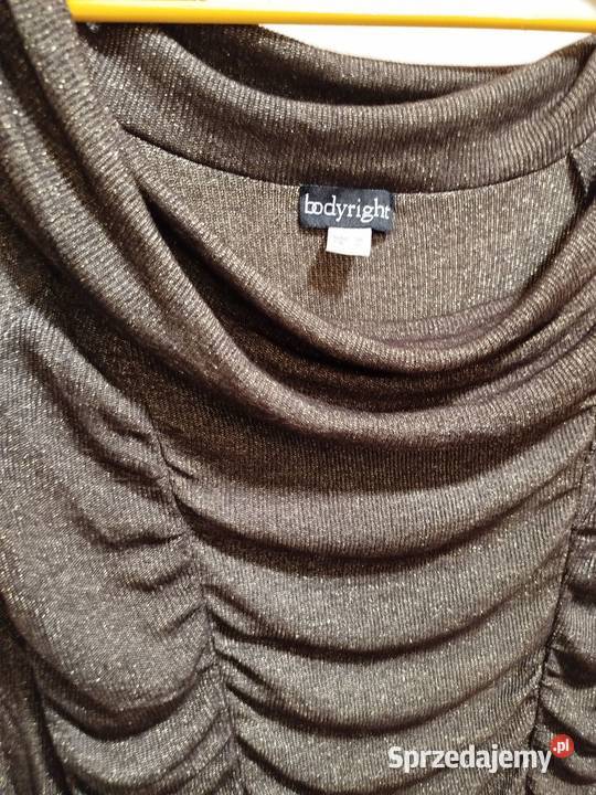 Dzianinowa sukienka połyskująca złotym rozmiar Długość Midi Biecz