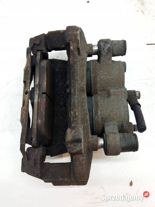 ZACISK HAMULCOWY PRAWY PRZÓD 20 TDCI E1GC2011LD