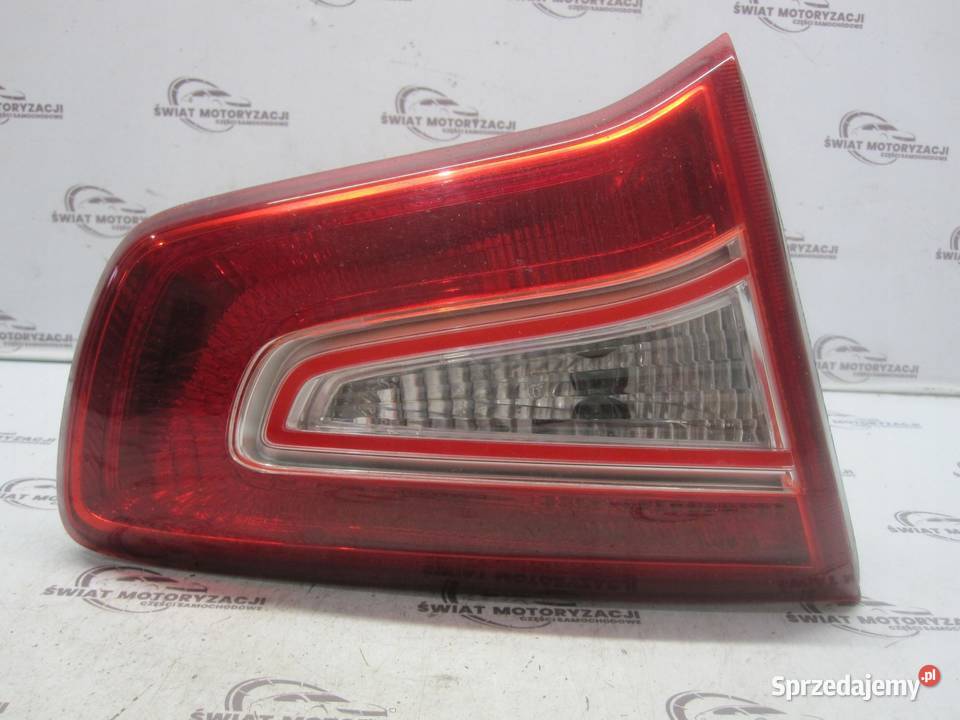 KIA SPORTAGE III 12r lampa lewa tył w klapę
