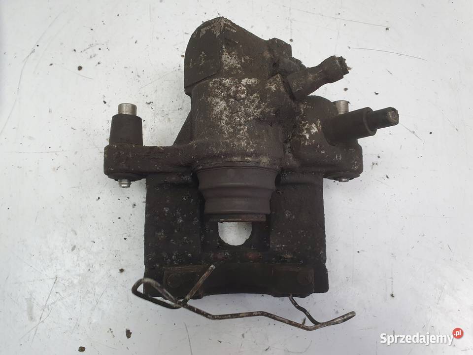 Volvo S40 V40 ZACISK HAMULCOWY Lewy tył kierowcy Rudka