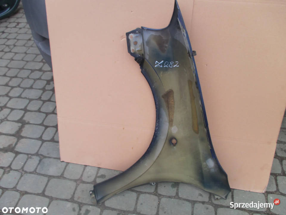 Błotnik prawy OPEL ASTRA II Z282 osobowe Radom