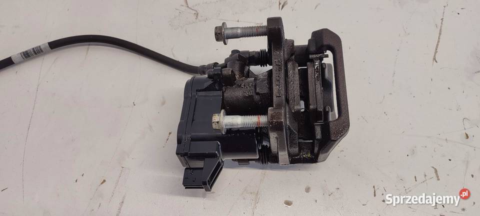 VOLVO XC40 ZACISK HAMULCOWY PRAWY TYŁ 32276922 Części samochodowe dolnośląskie