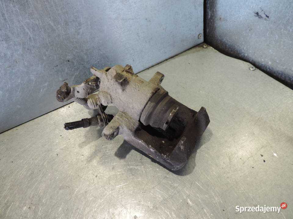 VW GOLF V 19 TDI ZACISK HAMULCOWY LEWY TYŁ Nowy Sącz