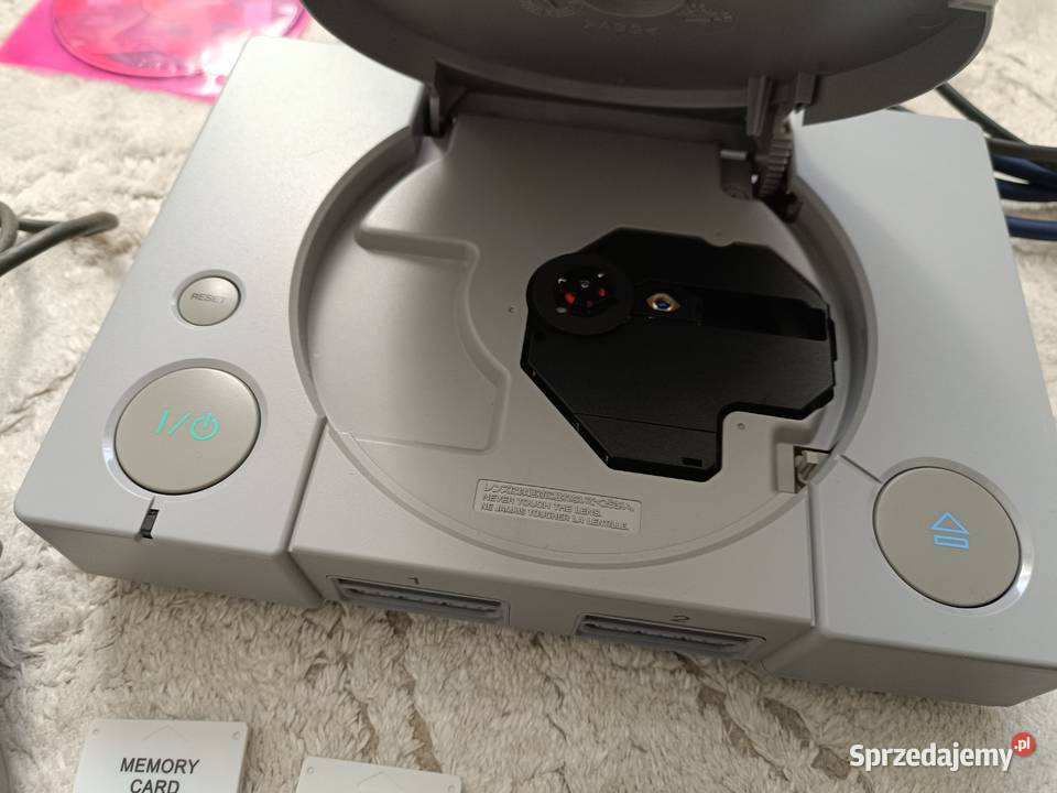 PlayStation 1 SCPH7002 2 pady 2 gry 2 karty Pruszków