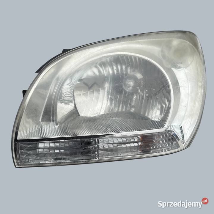 Lampa przednie reflektor lewy lewa Kia Sportage