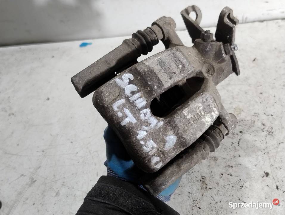 ZACISK HAMULCOWY LEWY TYŁ RENAULT SCENIC III 15