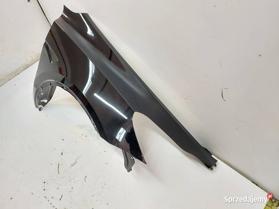 TESLA MODEL Y 2022r BŁOTNIK PRAWY PRZÓD czarny