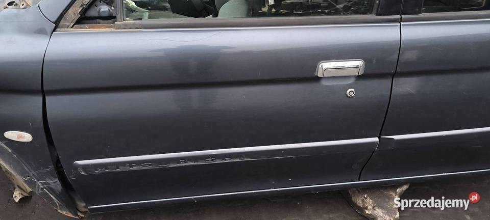 DRZWI LEWE PRZÓD MITSHUBISHI MONTERO